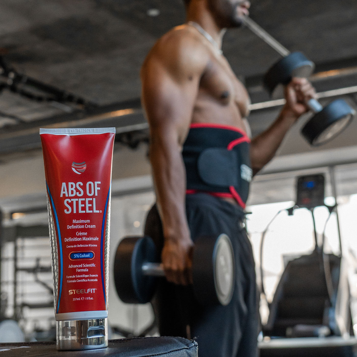 Man working out with Abs of Steel and waist trimmer