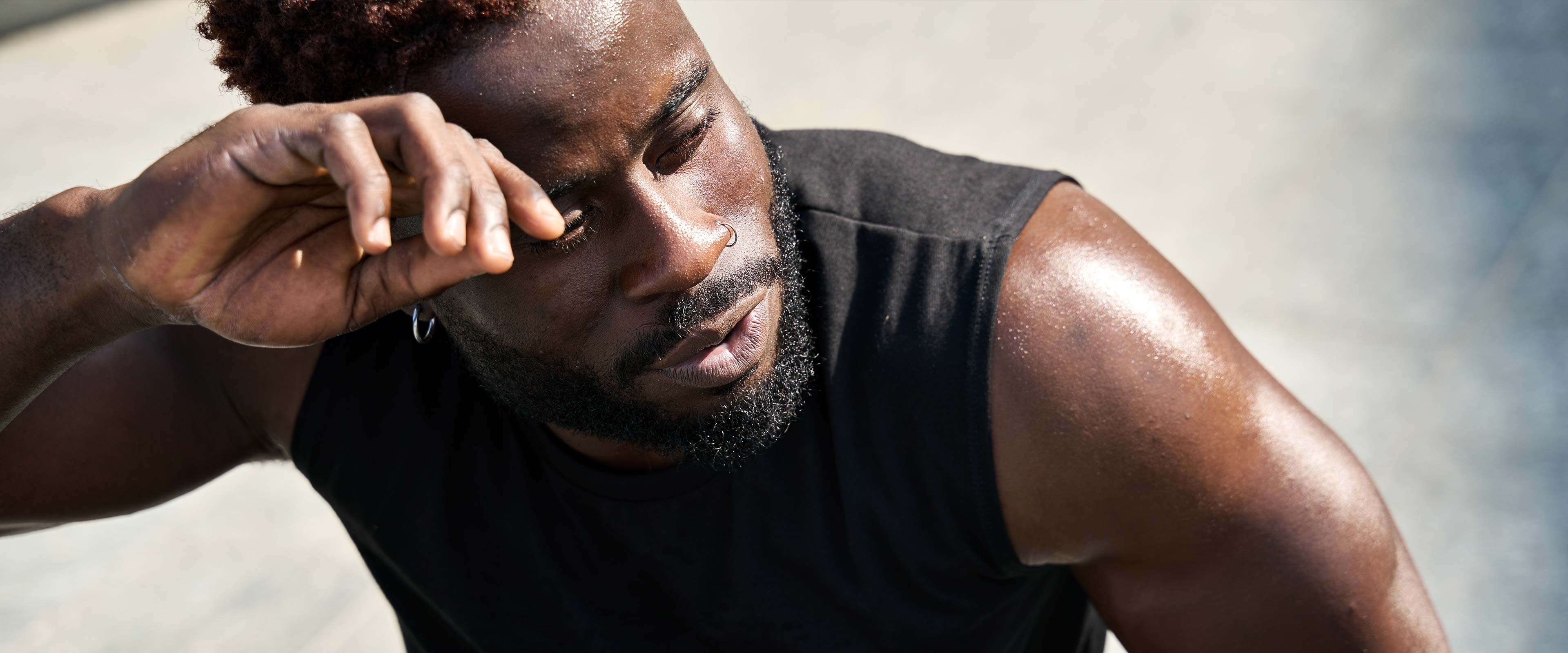 fit african american man sweating