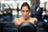 Fit woman swinging kettle bell