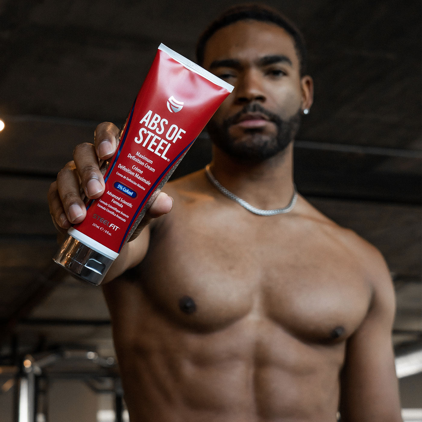 In shape male with Abs of Steel maximum definition cream