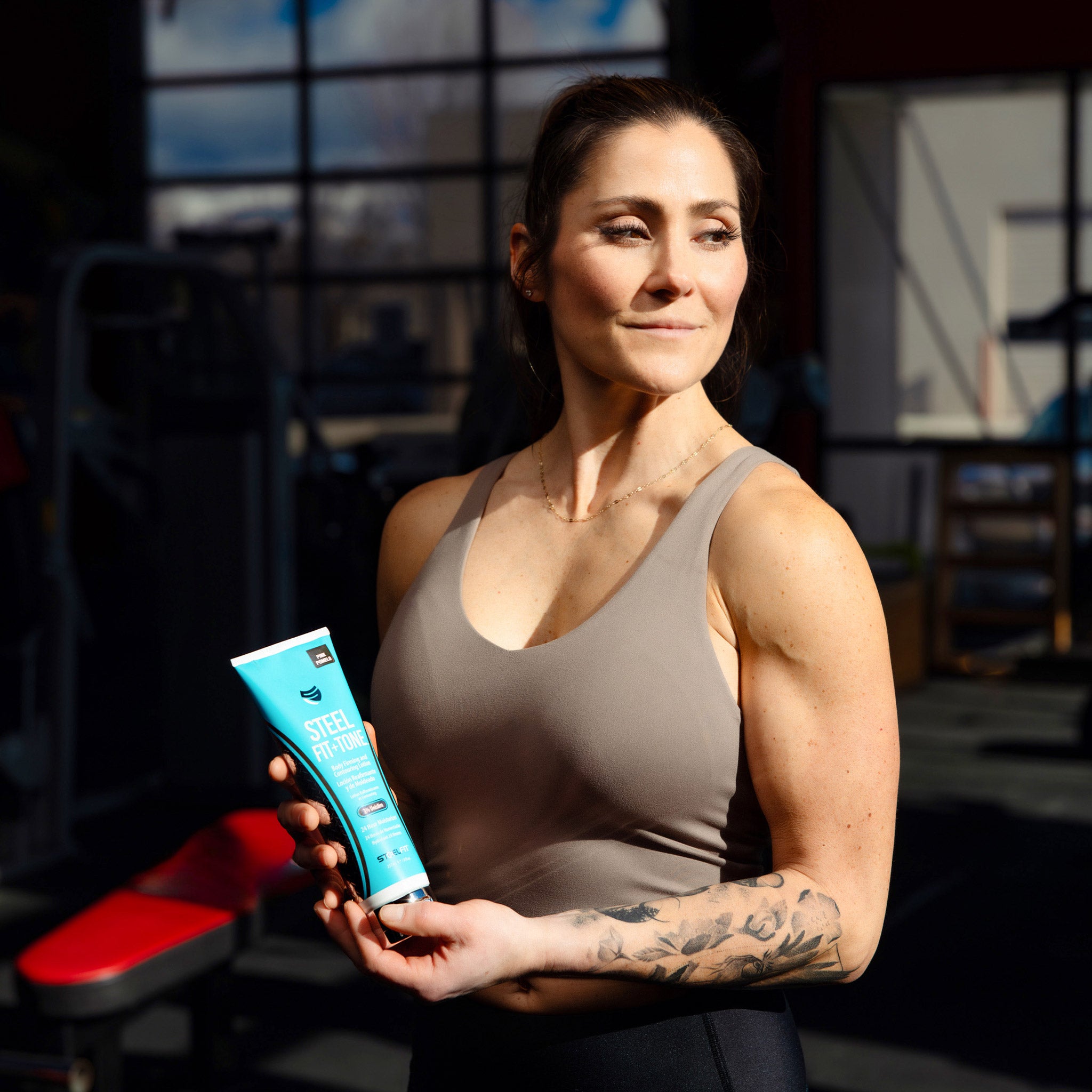 Woman with Fit + Tone lotion