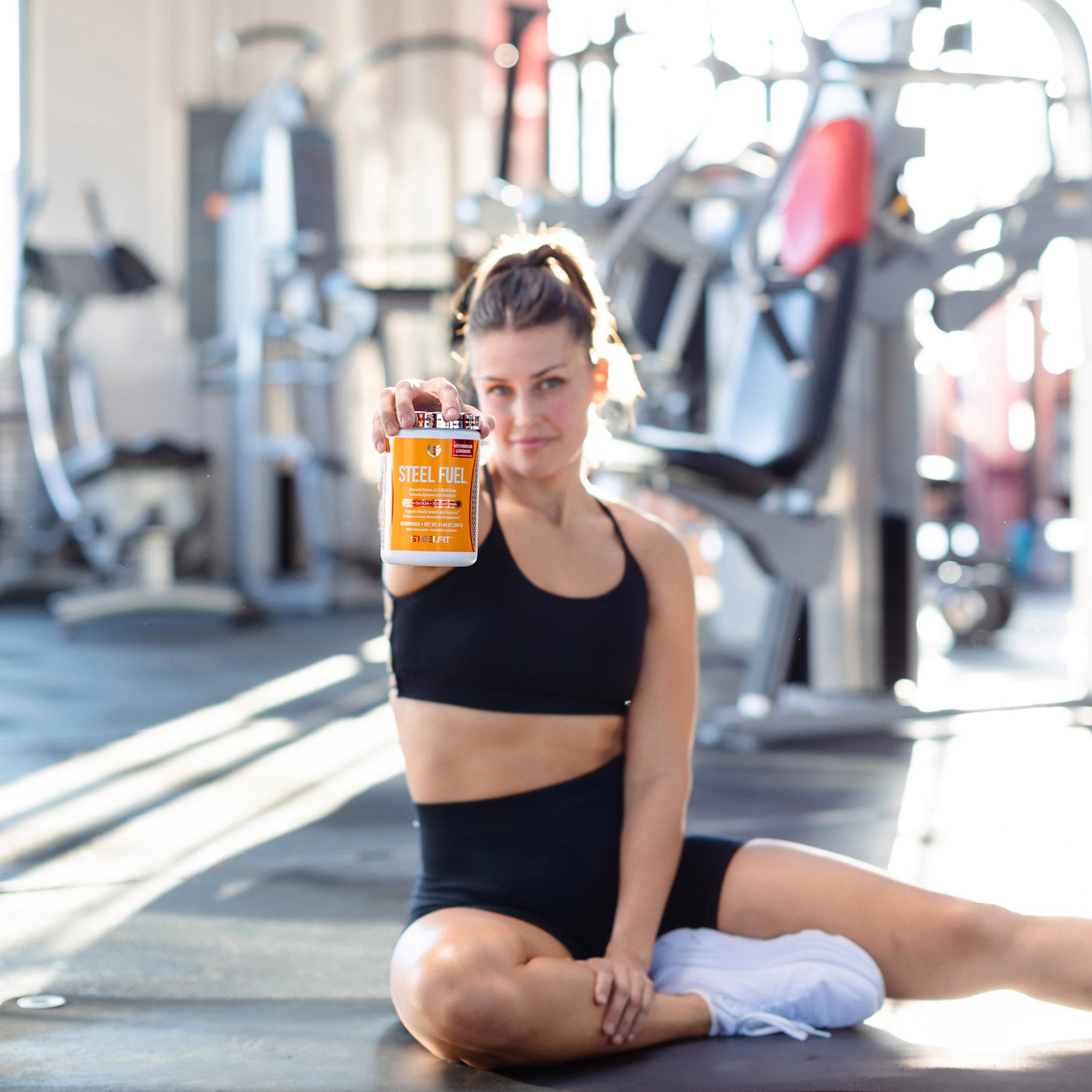 Woman with Steel Fuel BCAA