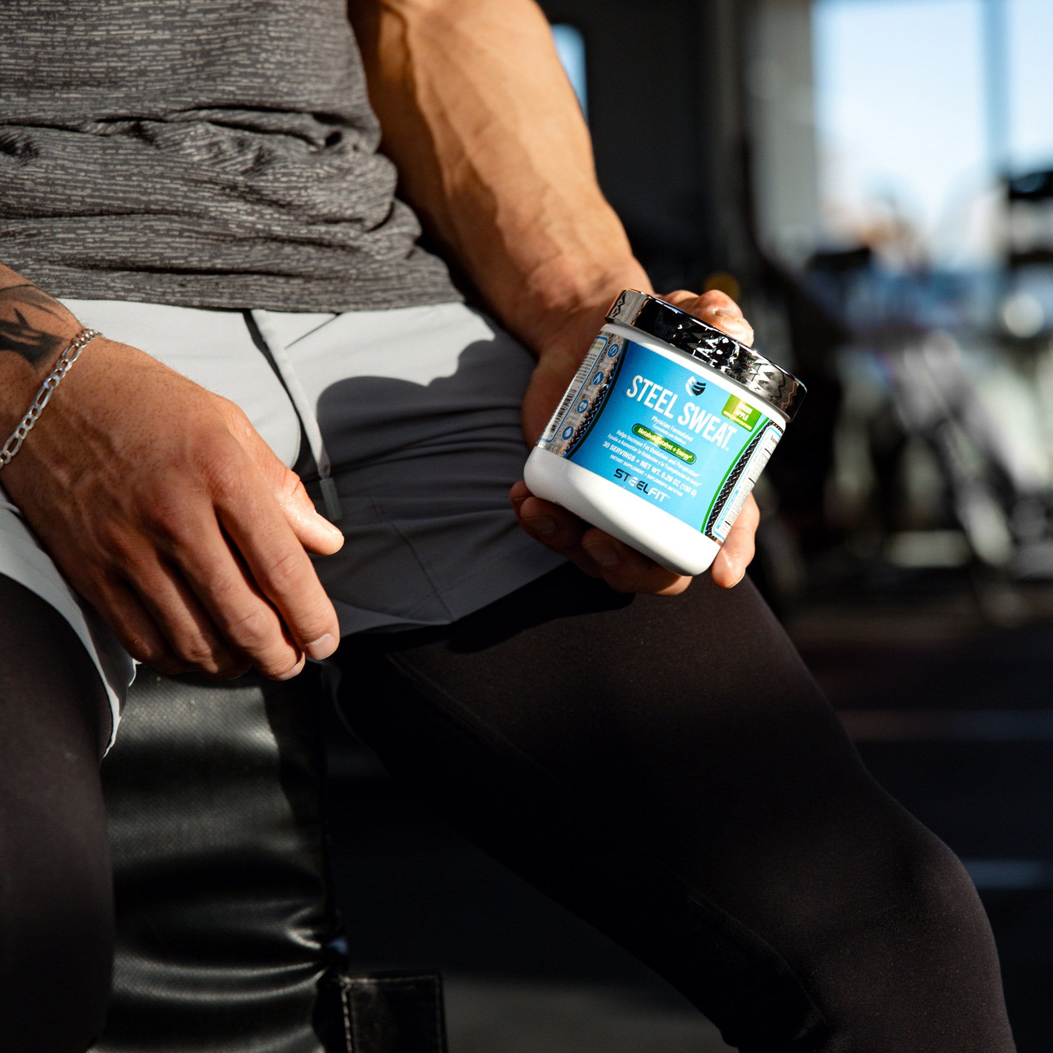 Man holding steel sweat