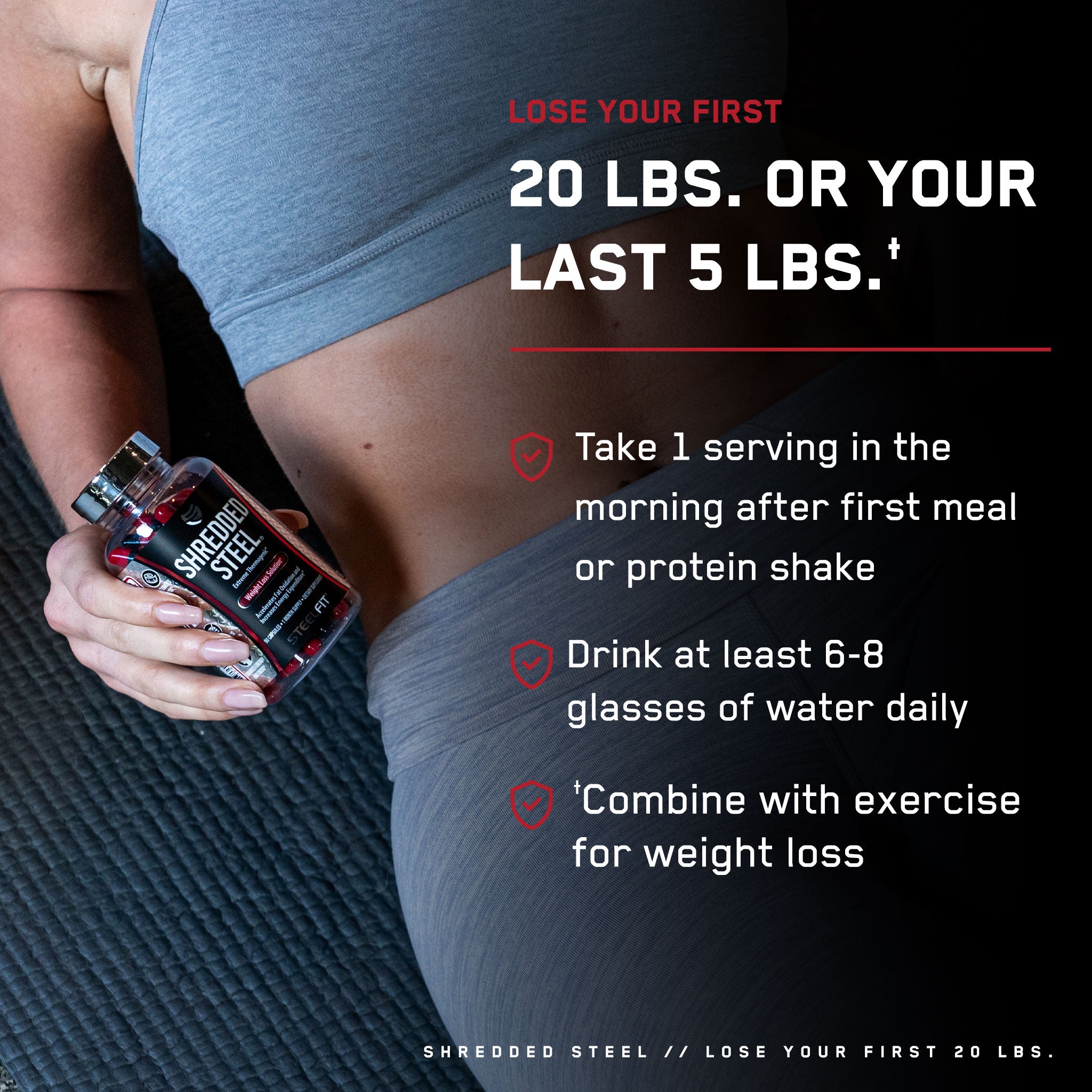 Woman lying on a mat holds a Shredded Steel® bottle, a thermogenic supplement designed to boost metabolism and energy while aiding in fat loss.